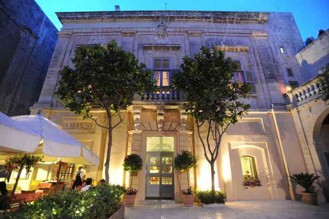 2-xara-palace-facade-evening