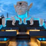 Patung ikonik di area GUA Art Resort Bandung dengan pencahayaan biru